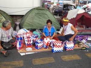 Protesters make merchandise to sell