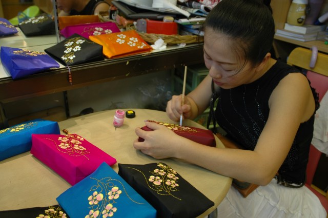 A stall-holder at Chatuchak Market, Bangkok
