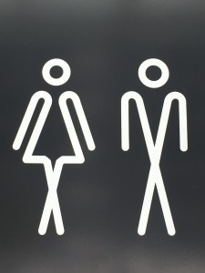Crossed-leg toilet sign