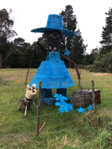 Female farmer sculpture in blue dress
