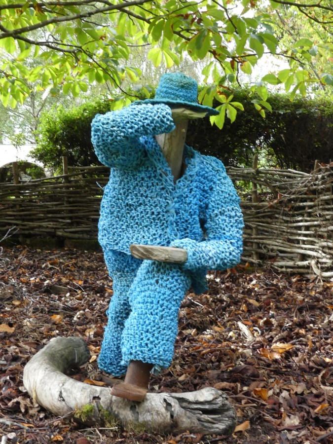 Blue farmer sculpture